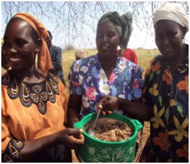 Women celebrate after making Sorghum Pilau-a dish made with Sorghum